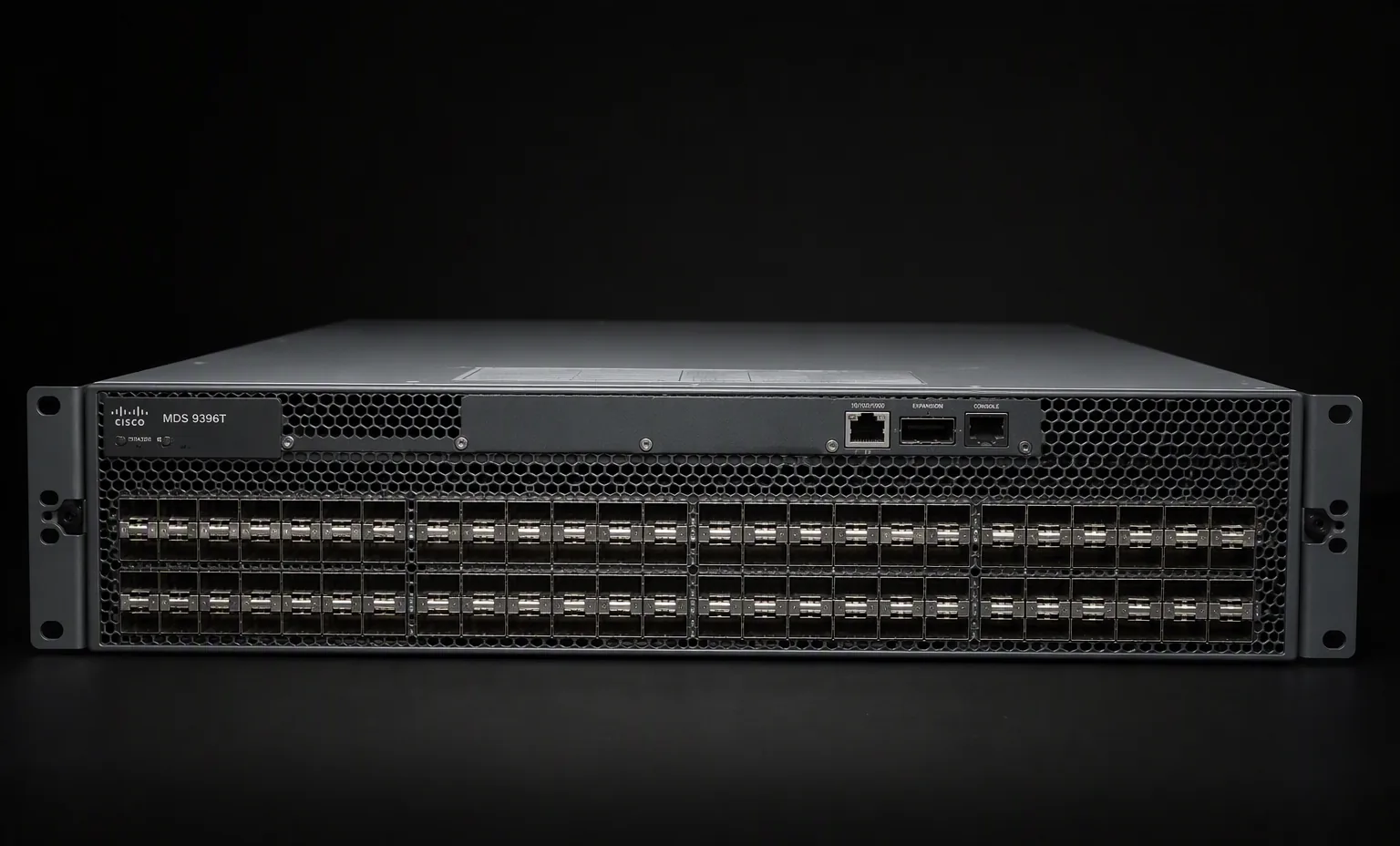 Cisco MDS 9396T 96-port FC switch 2U, front bezel view, dark studio.