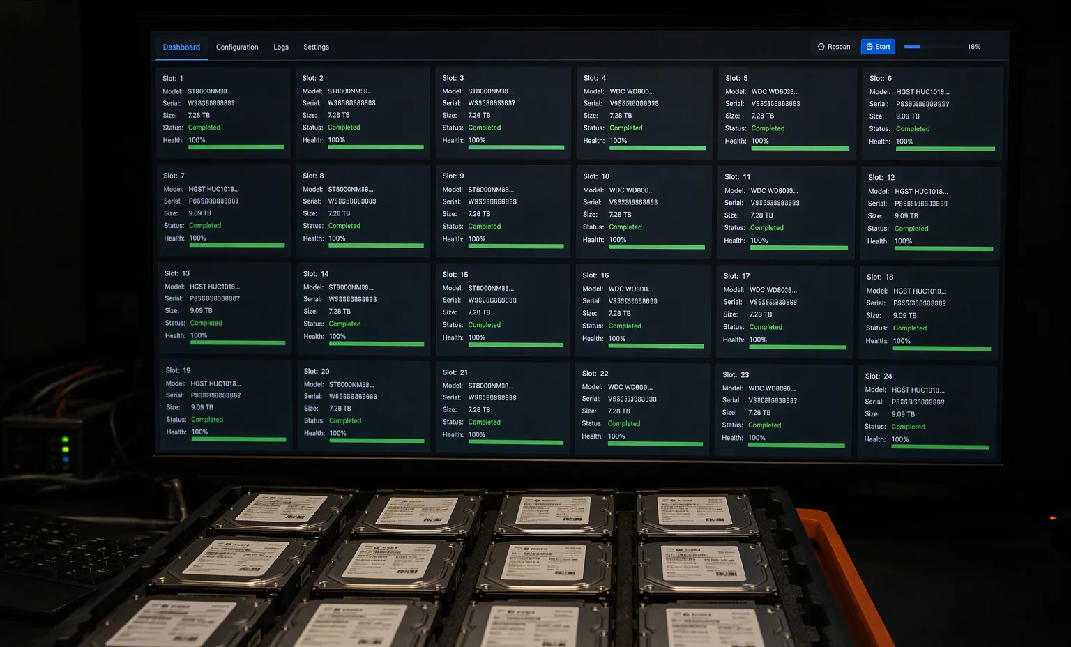 Photorealistic photograph of a dark lab monitor showing a grid of drive health scan results beside a tray of enterprise drives, dark environment.