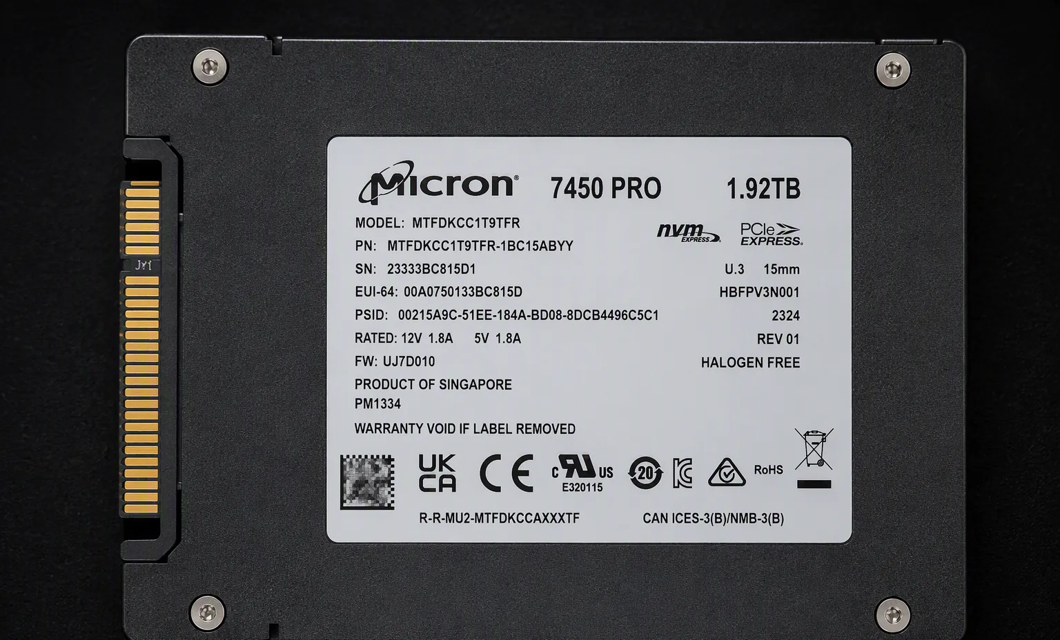 Micron 7450 PRO 1.92TB enterprise U.3 NVMe SSD, label view, dark studio macro.