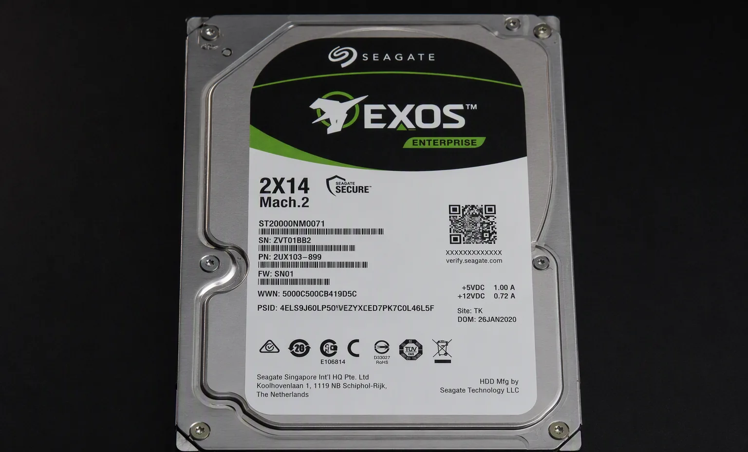 Seagate Exos 2X14 Mach.2 dual-actuator enterprise hard drive, top label view showing Mach.2 design, dark studio.