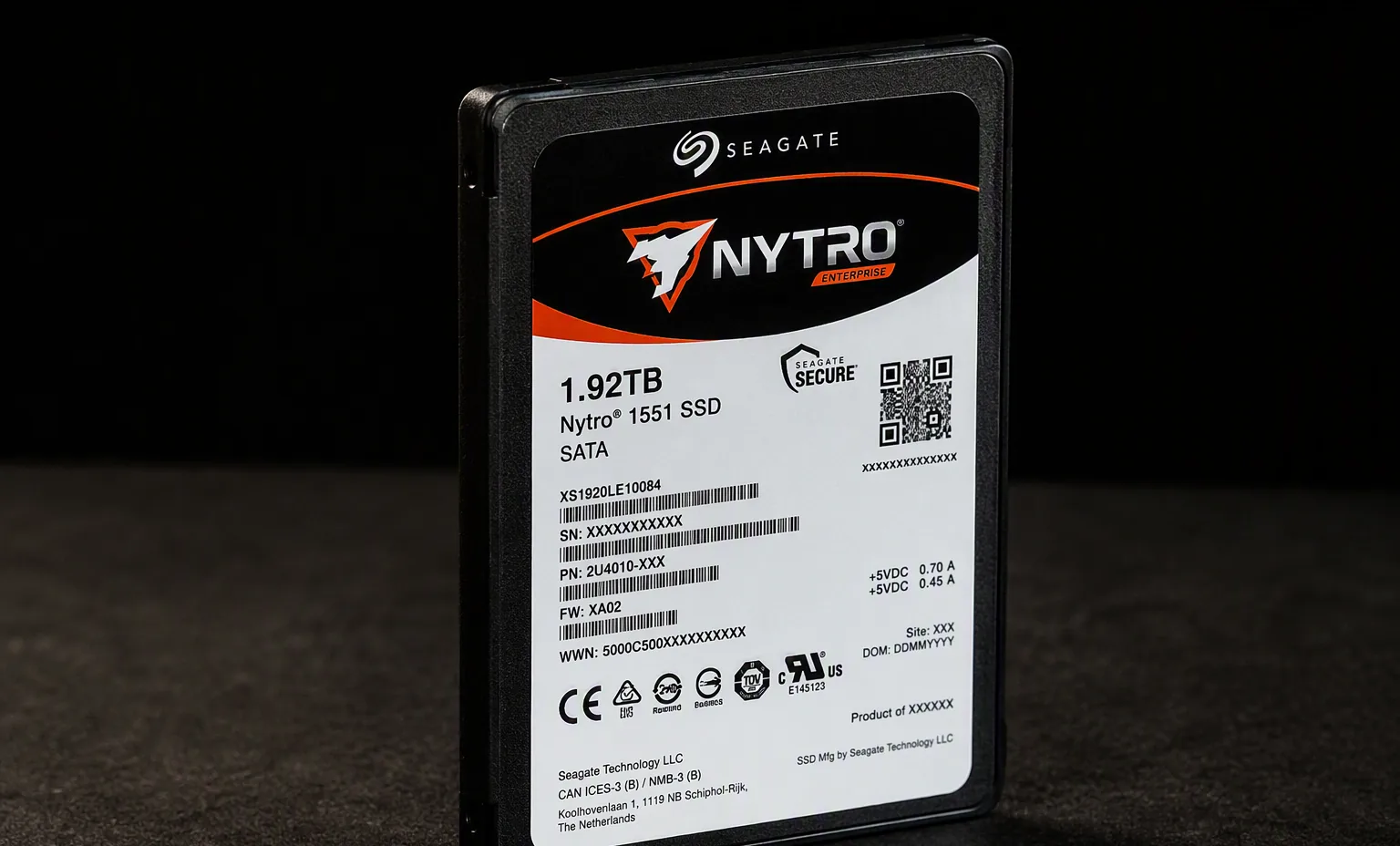 Seagate Nytro 1551 enterprise SATA SSD 2.5 inch, three-quarter view, dark studio background.